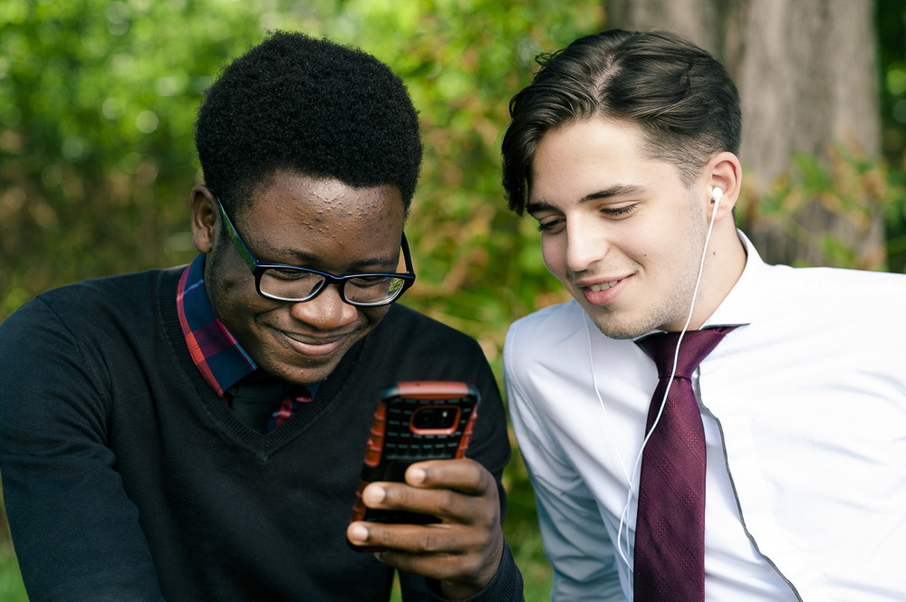 Two young people smiling and laughing together