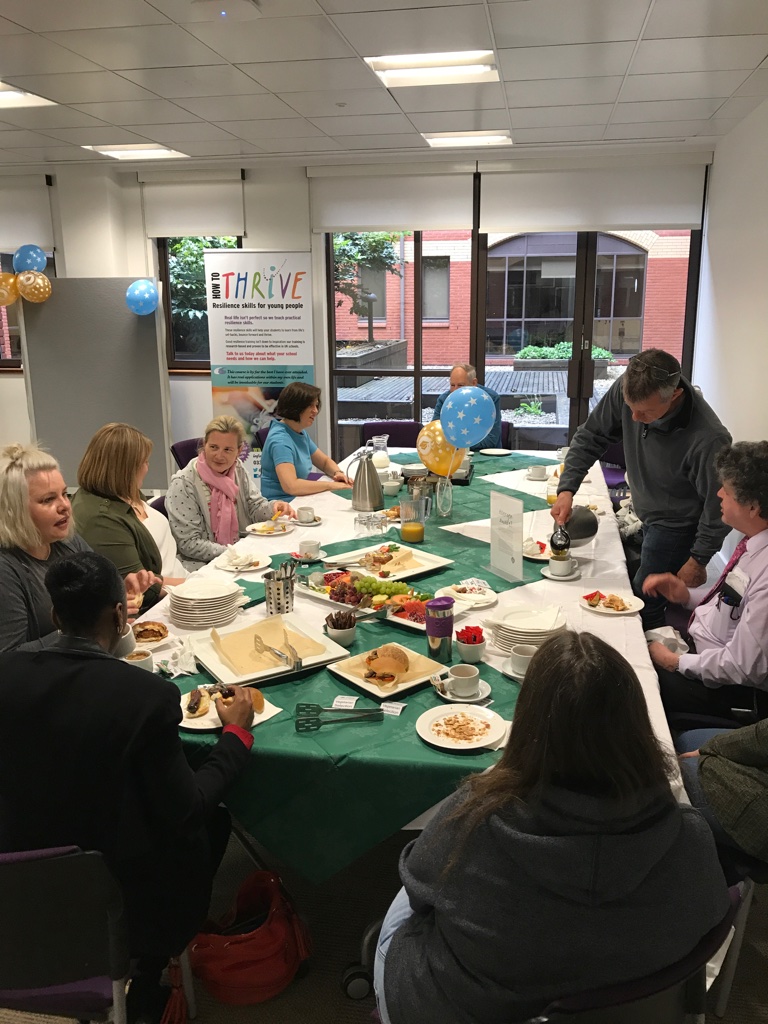 The team at a How to Thrive celebration